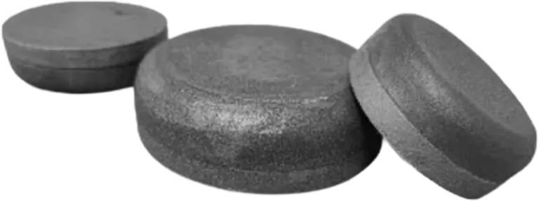 Bimetallic buttons and blocks