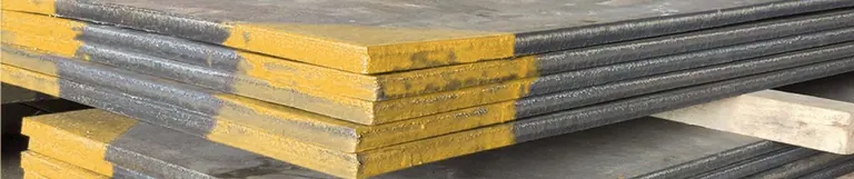 Smooth CCO plates stacked, showing the flat crack- and bead-free overlay surface